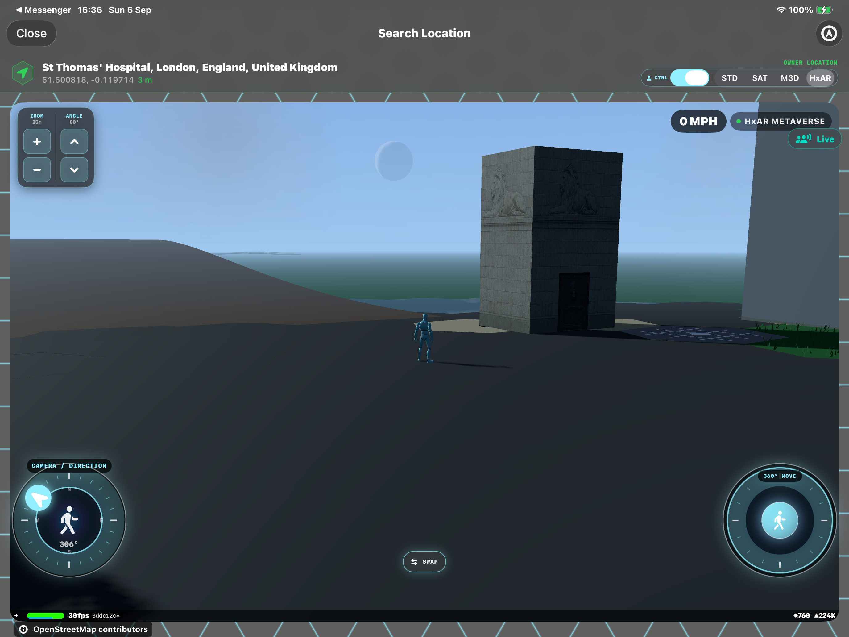 Avatar beside a small tower-shaped mapped property in the HxAR Metaverse near St Thomas’ Hospital in London.