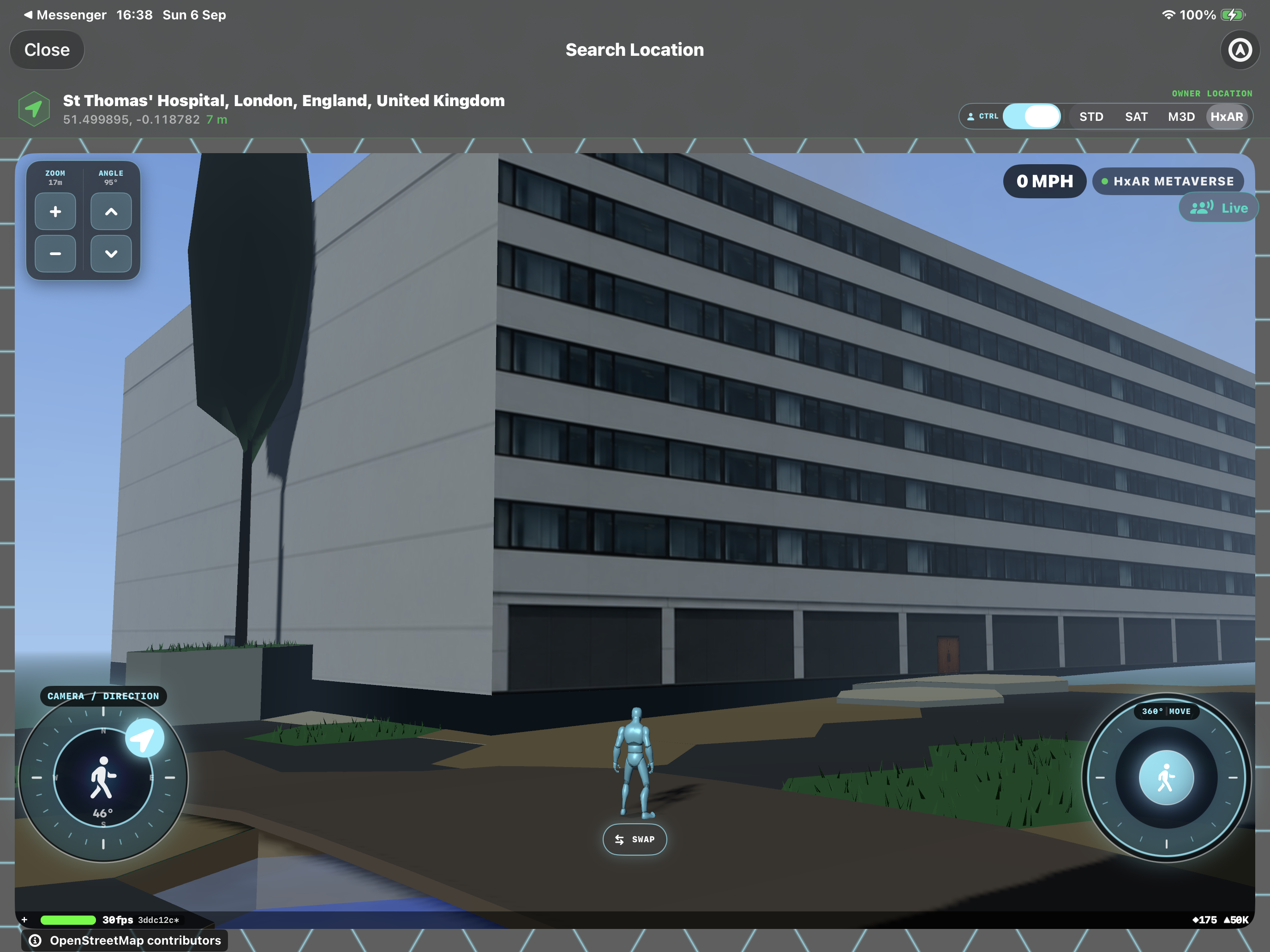 Avatar facing a large multi-storey building with detailed window and wall surfaces in the HxAR Metaverse.