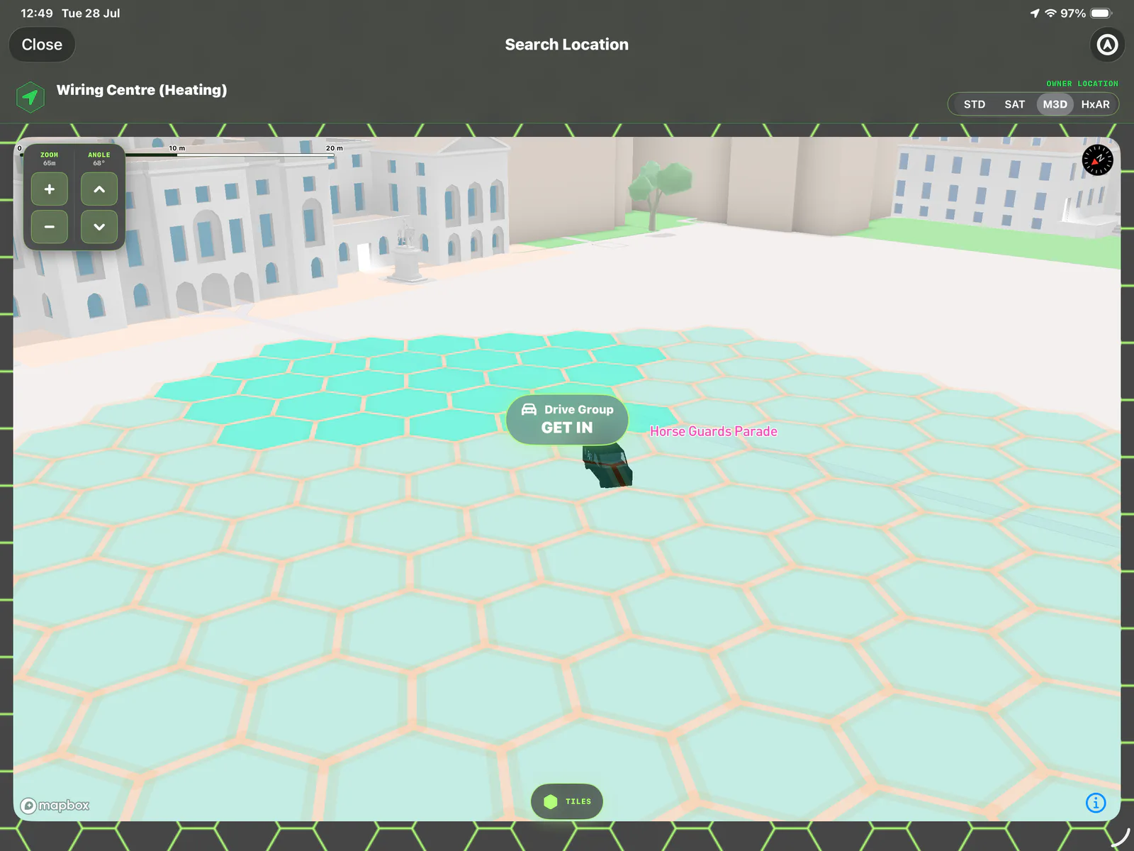 HxAR Property Visit with M3D selected, showing a Mapbox 3D city scene, translucent HexTile grid and a nearby virtual Drive Group.