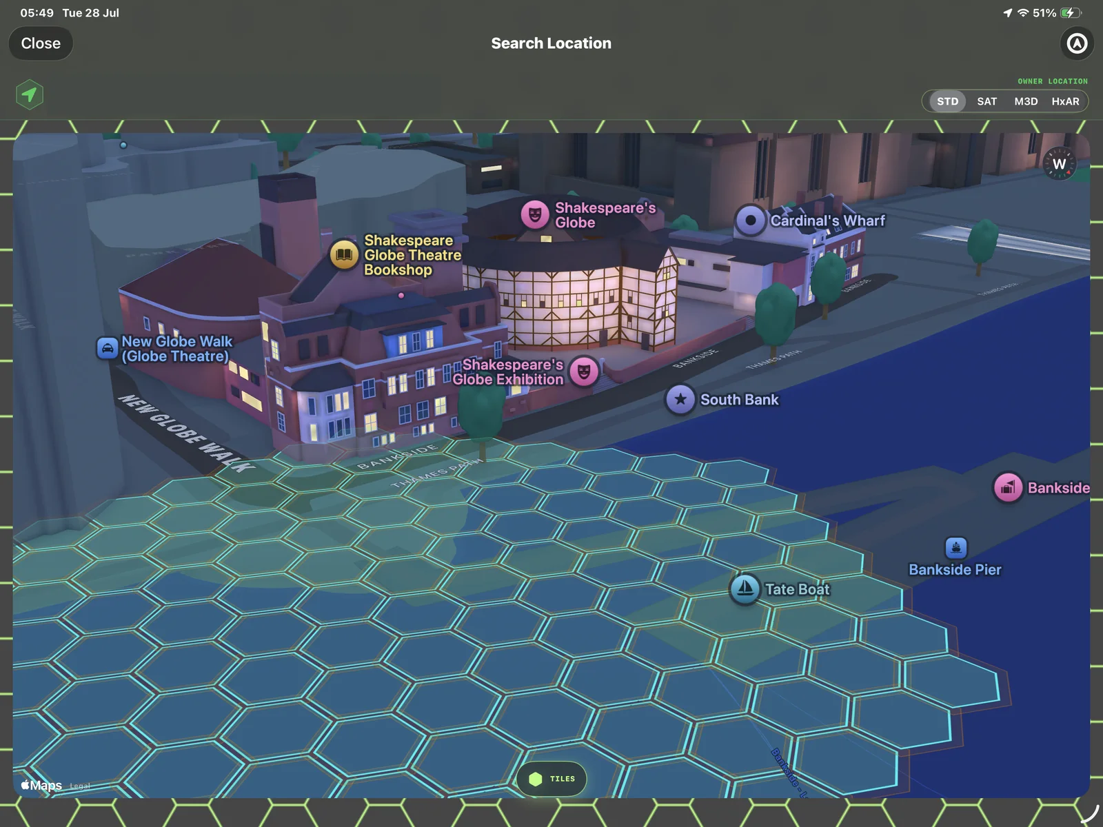 HxAR Search Location showing a cyan HexTile grid over a simplified three-dimensional city map with private location details hidden